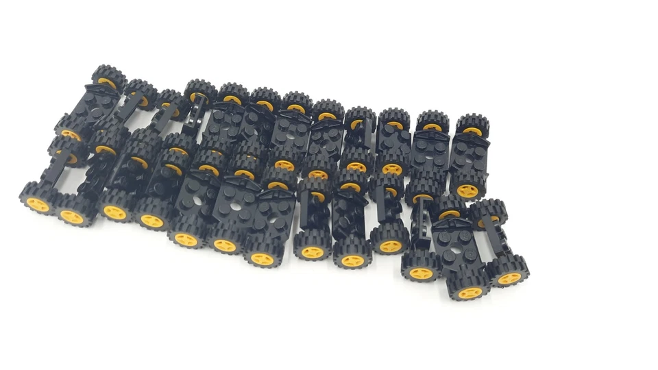 Lego Reifen Räder 4624 3641 50 STK + 25x  Achse Aufhängung Befestigung 4600 gelb - Bild 1 von 1