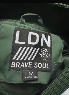 Green and white varsity jacket - Image 1 of 3