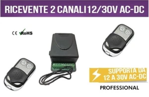 KIT RICEVENTE 2 CANALI 7A 12-30V AC / DC + 2 TELECOMANDI CANCELLI SERRANDE LUCI - Foto 1 di 1