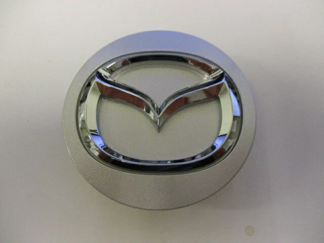 Tampa central Mazda 3, 6, CX-7, CX-9, MX-5 (1) BBM237190 - Imagem 1 de 1