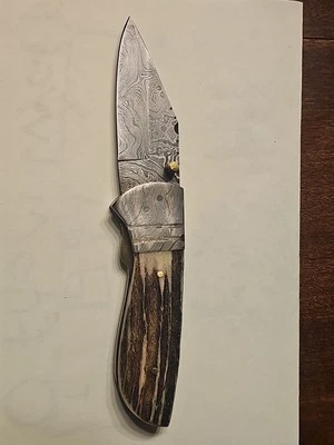 Custom Damascus Blade Lock Back  With Textured Handle and leather Sheath  - Image 1 of 4