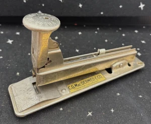 Antica cucitrice da scrivania MacDermed & Co. Denver Bostitch metallo lunga 6,75" USA 1924 - Foto 1 di 10