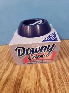 Downy Care Dispenser New In Packaging Excellent Condition Please View Photos.