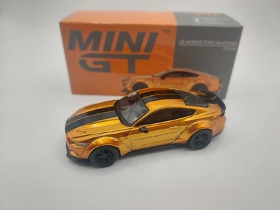 Mini GT MGT00847LHD LB-WORKS FORD MUSTANG LB Gold Die Cast 1/64 - Immagine 1 di 3