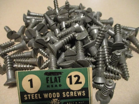 36 - NEW-OLD STOCK, SLOTTED FLAT HEAD STEEL WOOD SCREWS, 1" LONG X #12 = 7/32" Cover