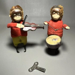 2x Schuco Germany Scimmia Carica Musicisti Una Chiave Entrambi Funzionanti - Foto 1 di 14