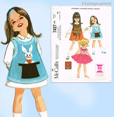 McCall's 7427: 1960s Uncut Toddler Girl Play Apron Sz 4-5 Vintage Sewing Pattern - Image 1 of 4