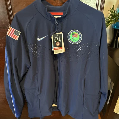NUEVAS Etiquetas Nike Mujer París 2024 Equipo EE. UU. Emitido Podio Paralímpico Chaqueta XL $400 Foto 1 de 4