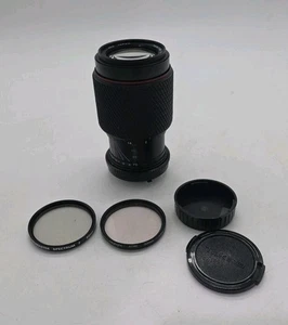 Lente de montaje Tokina70-210 mm F4-5,6 Nikon F con cubiertas y filtros - Imagen 1 de 6