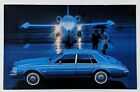 1983 Cadillac Séville voiture de luxe vintage carte postale publicitaire jet 