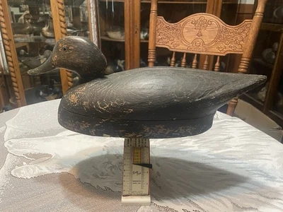 Arte popular antiguo de pato negro Foto 1 de 4