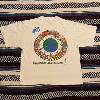 Camiseta blanca de colección firmada Shannon MacMillan 1996 Juegos Olímpicos de Atlanta banderas mundiales M Foto 1 de 4