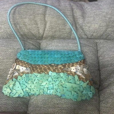 Cartera de mano Shell turquesa con cuentas/madera Foto 1 de 4
