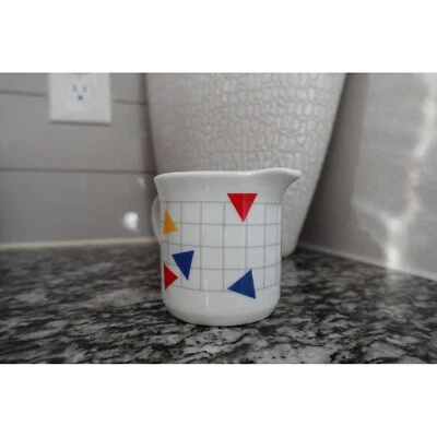 Jarra crema rejilla geométrica vintage diseño triángulo colorido decoración retro Foto 1 de 4