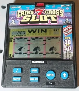 Vintage Radica Criss Cross 7 Slot Handheld Game Model 972 - Picture 1 of 2