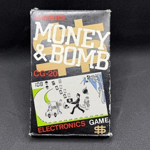 Casio CG-20 Dinero y Bomba Juego CIB con Manual y Notas De Colección Años 80 Envío Rápido Gratis - Imagen 1 de 8