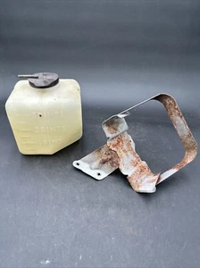 1962 - 1972 Chevrolet windshield washer fluid reservoir bottle, bracket and cap - Picture 1 of 7