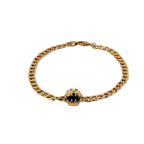 Bracciale Gucci catena cordino leone con diopside cromato realizzato in oro giallo 18 carati