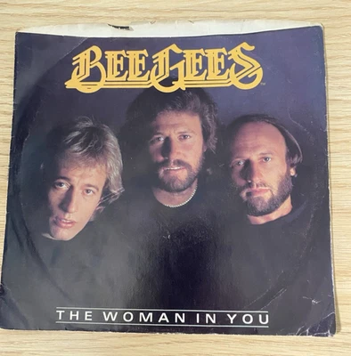 1983-THE BEE GEES , 7" RSO RECORD, "THE WOMAN IN YOU / STAYING ALIVE ", POP ROCK - Image 1 of 3