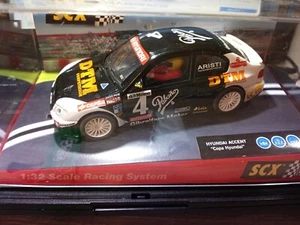 SCX HYUNDAI ACCENT "COPA HYUNDAI" # 4 BLACK / WHITE - Picture 1 of 9