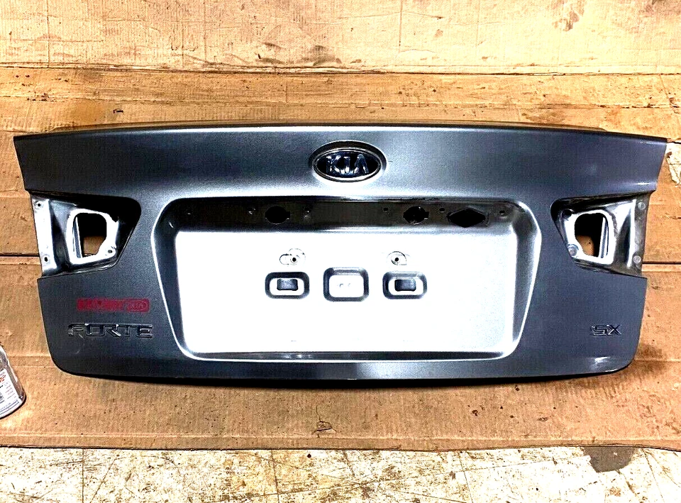 2010 - 2013 KIA FORTE СЕДАН ЗАДНИЙ БАГАЖНИК КРЫШКА КОРПУСА СЕРЫЙ OEM - Изображение 1 из 4