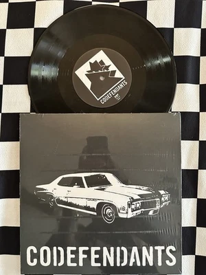 Codefendants X Get Dead Split - OOP!! Black Label Edition!! 10” Vinyl Record - Image 1 of 3