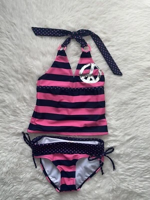 NUEVO CON ETIQUETAS TRAJE DE BAÑO TANKINI JUSTICE NIÑAS 7 ROSA AZUL MARINO RAYAS LUNARES PEACE SIG Foto 1 de 4