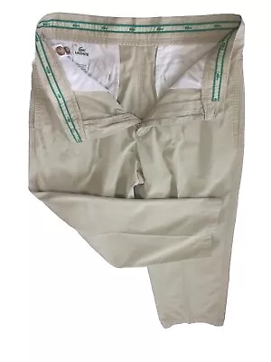 Pantalones chinos plisados vintage Lacoste 42 entrepierna 26 pulgadas beige marrón algodón Foto 1 de 4