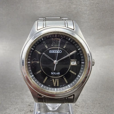 Reloj Seiko Solar Hombre 36mm Esfera Negra Tono Plateado Fecha Redonda V145-0BS0 Funciona Foto 1 de 4