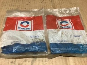 NOS GM 4911142 ORIGINAL GM NOS PART GROMMET oem 4 Lot - Picture 1 of 3