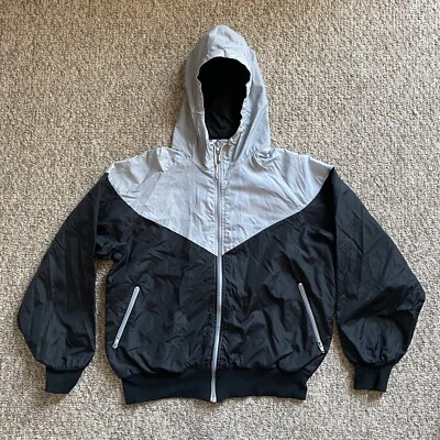 Chaqueta cortavientos Nike para mujer grande L negra gris nailon con capucha cremallera completa vintage Foto 1 de 4