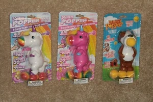 Animal Poppers (1) Unicorn or Dog Pink White Brown Shoots Balls Fun Foam Squeeze - Picture 1 of 10