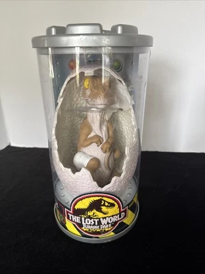 The Lost World JURASSIC PARK T-REX Hatchling Vintage 1997 Kenner NUEVO SELLADO Foto 1 de 4