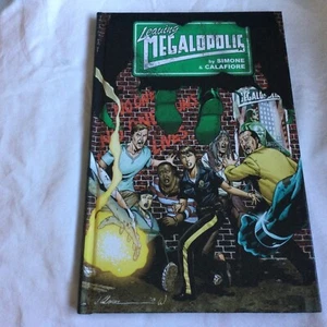 Leaving Megalopolis von Simone & Calafiore - Hardcover - BRANDNEU!! - Bild 1 von 6