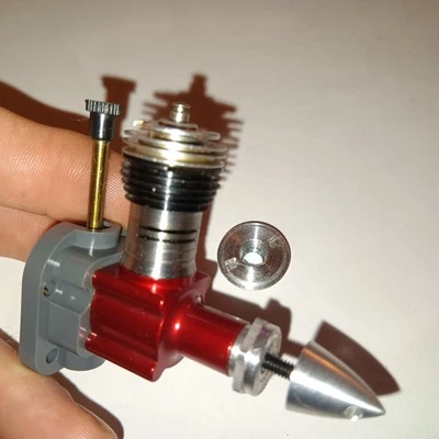 New COX RED SCORPION .049 model plane glow engine with conversion head. - Image 1 of 4