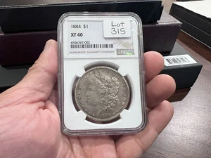 1884 MORGAN SILVER DOLLAR $1 NGC XF40 PHILADELPHIA - Picture 1 of 3