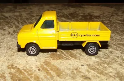 1/64 ford transit yellow flatbed truck in nice shape used - Image 1 of 4