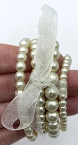 Faux Pearl Stretch Bracelets 4 Pc Cream Color, White Ribbon, Good Condition - Picture 1 of 5