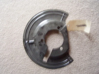 09 10 11 12 Dodge Ram 1500 Protector de freno delantero derecho OEM 52010138 2009 2012 Foto 1 de 2