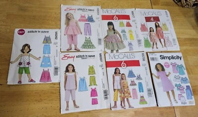 LOT OF 7! McCalls Patterns SIZES 2-8 New **see Description - Image 1 of 4