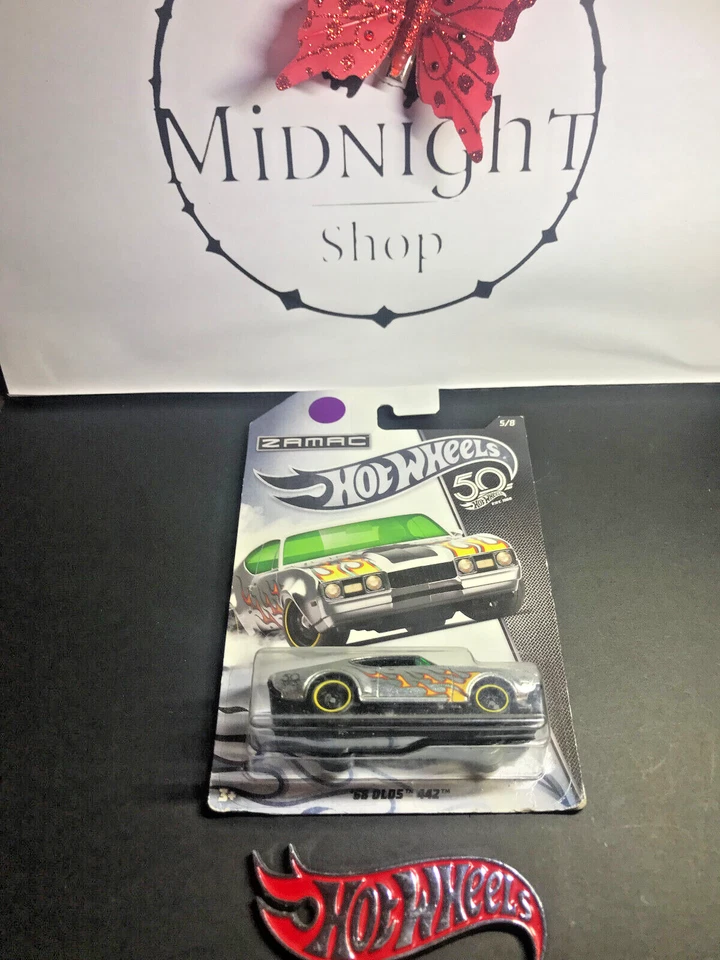 Hot Wheels Olos Zamac 1/64 neuf cadeaux collection Matchbox - Photo 1/1