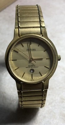 Reloj de cuarzo vintage FUTURA tono dorado para hombre fecha necesita batería Foto 1 de 4