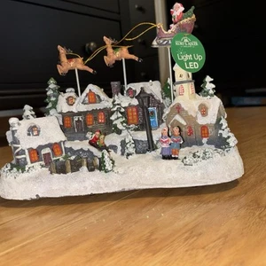 Christmas Kurt Adler Battery Operated Musical LED Village Santa & Deer 11x8.5’’ - Picture 1 of 9