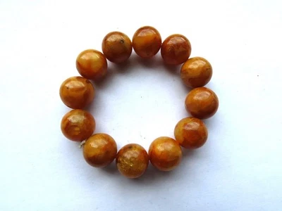 Altes elastisches Armband Bernstein, Gewicht; 25,1 Gr, 12 Kugel. - Bild 1 von 4