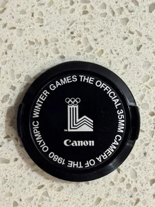 Canon - The Official 35MM Camera Of The 1980 Olympic Winter Games - Lens Cap - Picture 1 of 4
