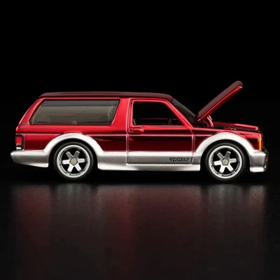 Hot Wheels RLC 2025 exclusivo: GMC Typhoon Spectra 1992 rojo llama (nuevo) Foto 1 de 4