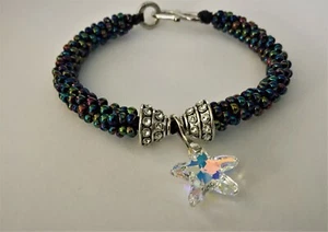 Perlen Kumihimo Armband mit Swarovski Kristall Seestern - Bild 1 von 5