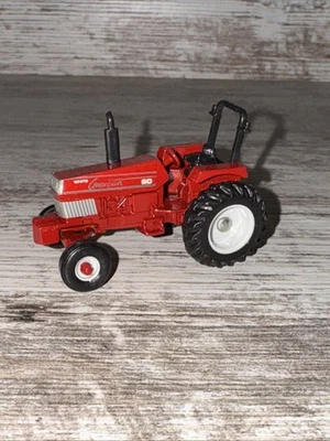 1/64 Scale White American 60 2wd Tractor Die-Cast Ertl Loose Red - Image 1 of 4