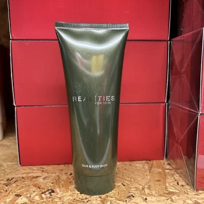Gel de ducha/lavado corporal y cabello Realities 3,4 oz Foto 1 de 2