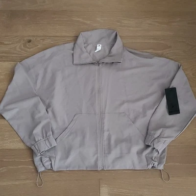 Chaqueta deportiva 90 Degree by Reflex beige manga larga pequeña cremallera frontal completa para mujer Foto 1 de 4